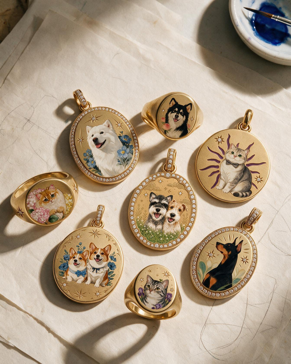A hand-painted enamel miniature pendant beside the dog it was painted from