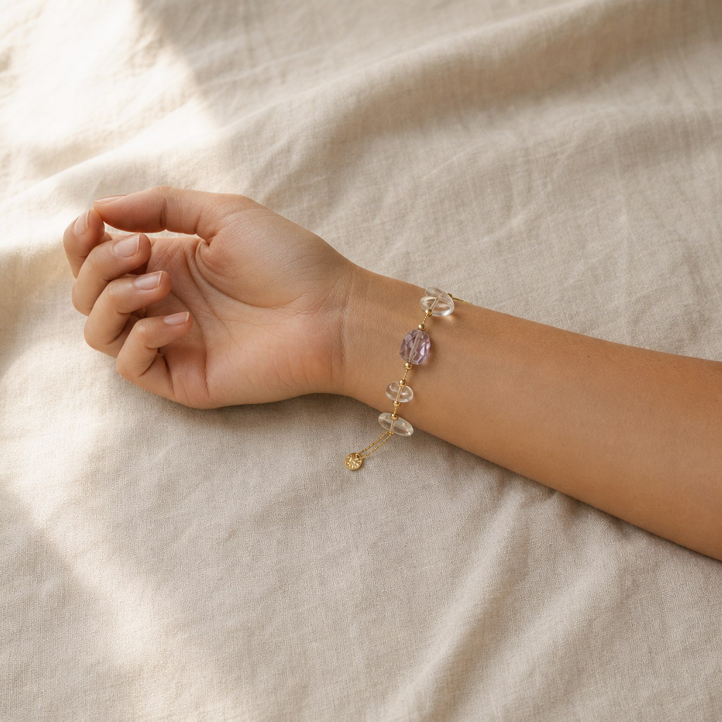 A Peace Piece Seren natural-stone bracelet worn close on a woman's wrist...